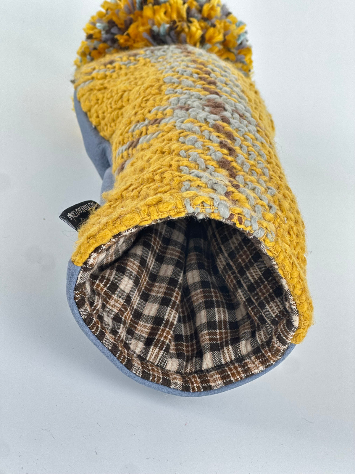 Misty Morning driver headcover showing brown and cream plaid lining with golden yellow textured wool exterior