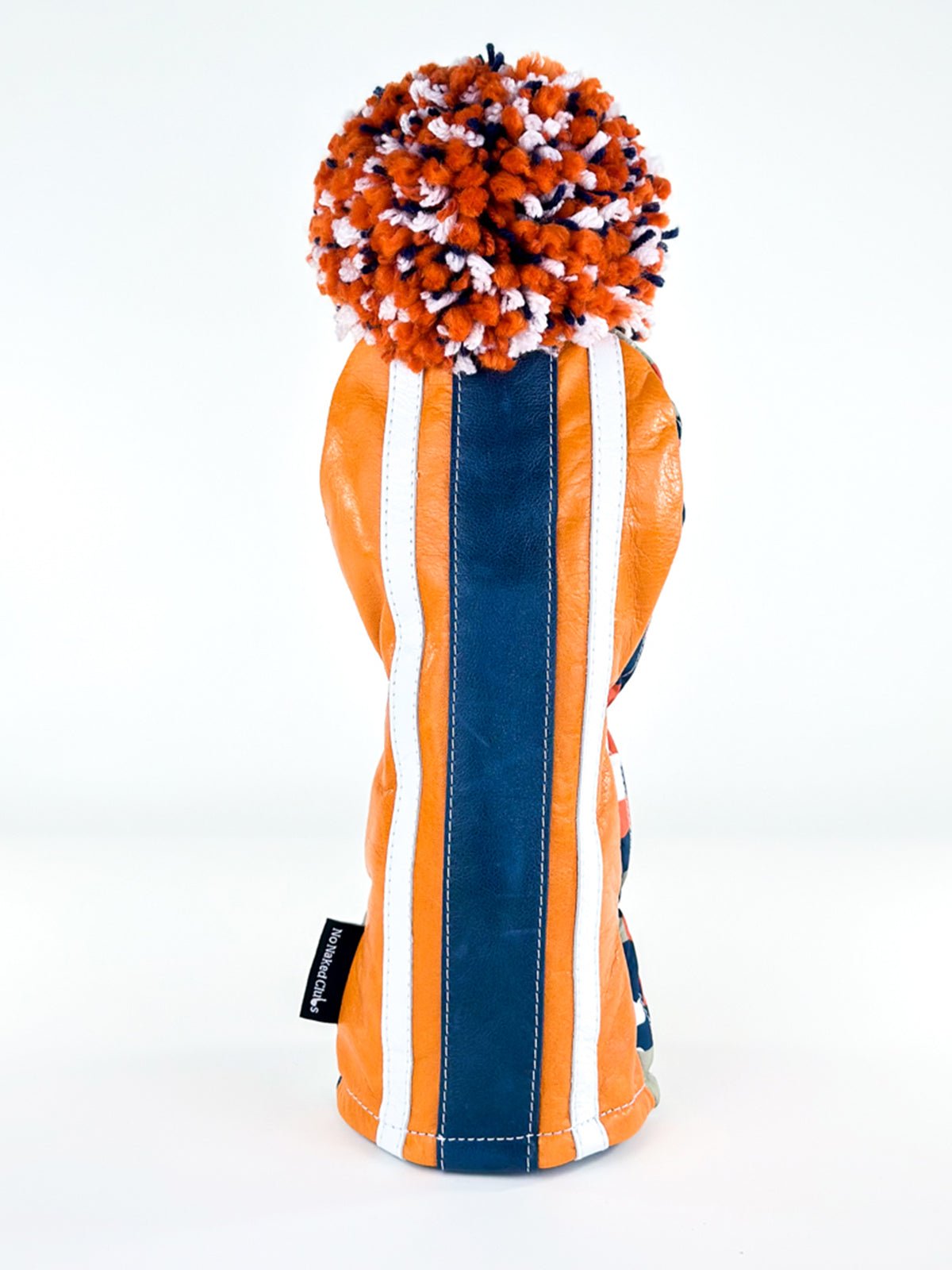 Canyon Rally burnt-orange leather driver headcover with navy racing stripe and wool pom pom